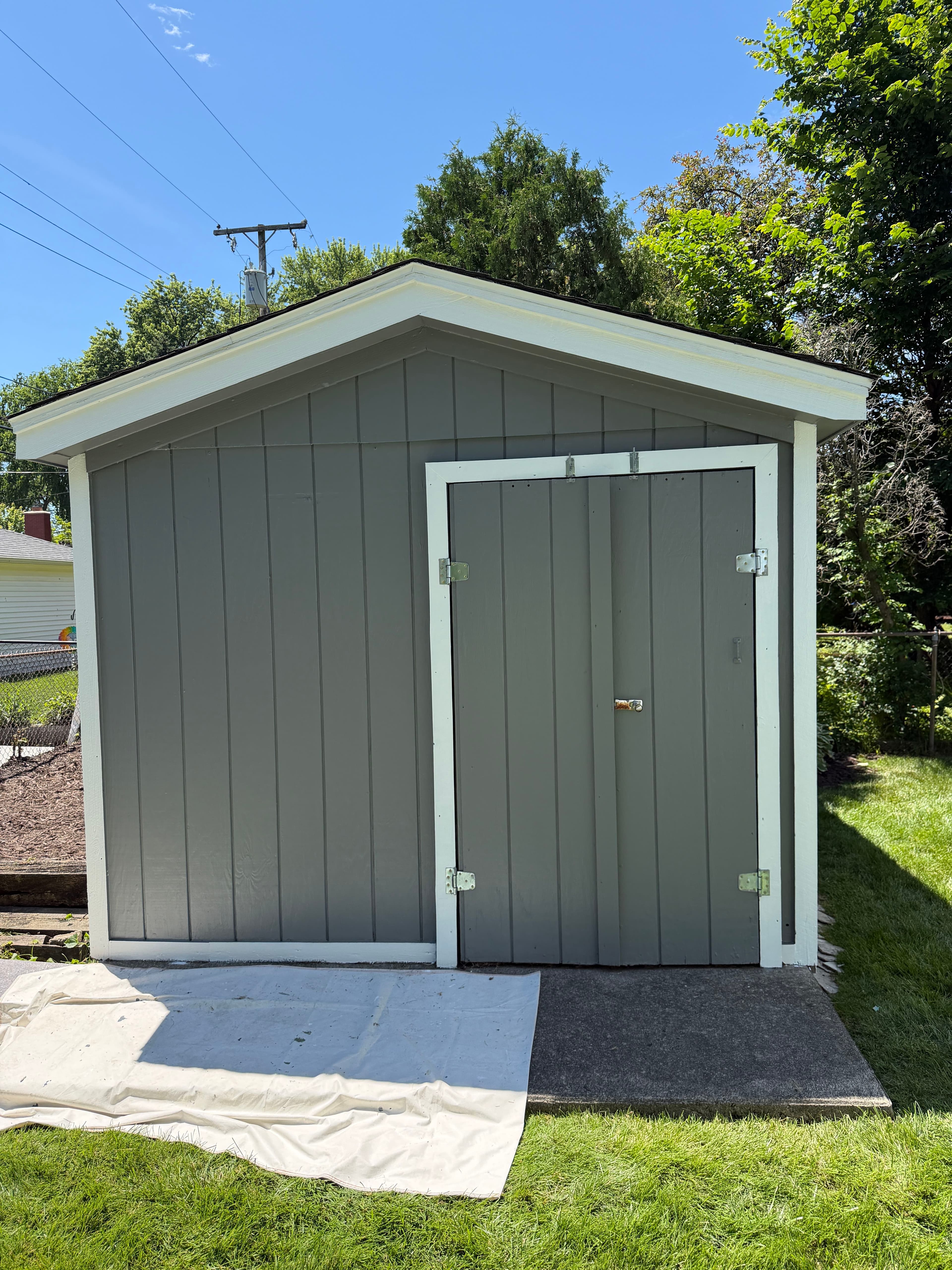 Project Exterior Shed Paint Job Done Right - 3 Coats and Fresh White Trim image